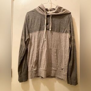 Light weight hoodie. Feels like t-shirt material.